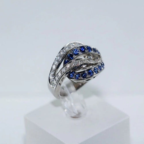Bague 53 Bague entrelacée en or gris 18 carats, saphirs et diamants 58 Facettes