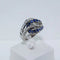 Bague 53 Bague entrelacée en or gris 18 carats, saphirs et diamants 58 Facettes