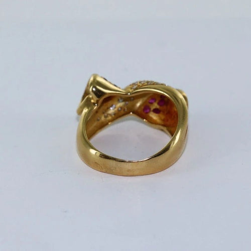 Bague 56 Bague nœud croisée en or jaune 18 carats, diamants et rubis 58 Facettes