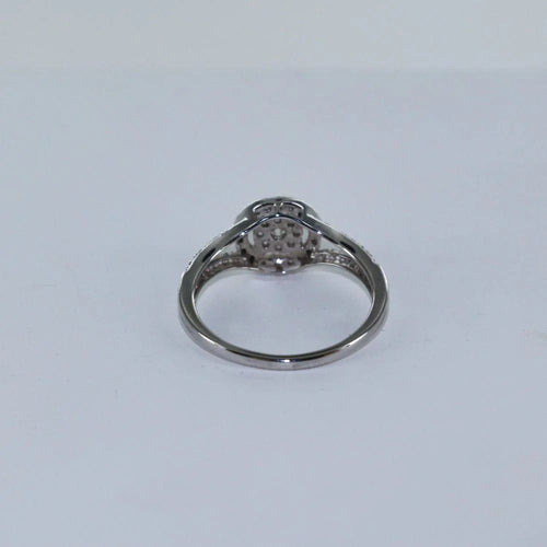 Bague 53 Bague en or gris et diamants 58 Facettes