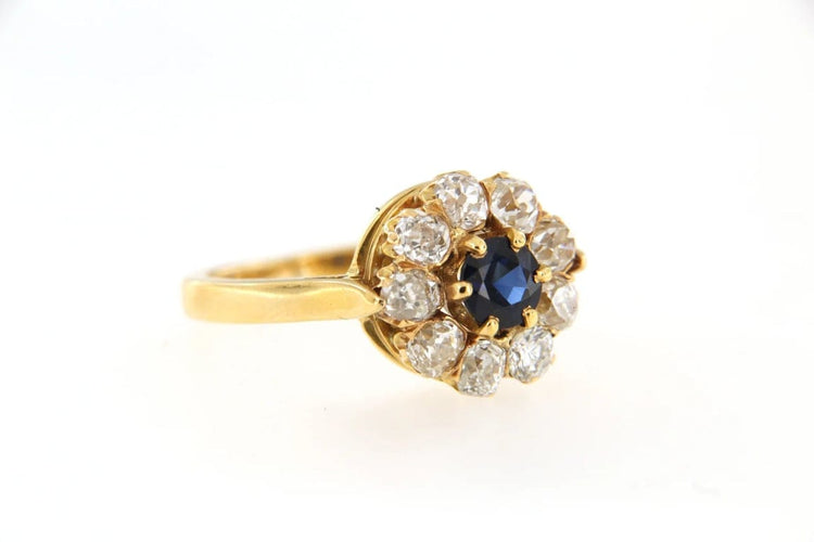 Bague 52 Bague marguerite en or jaune 18 carats, saphir et diamants 58 Facettes 4172l