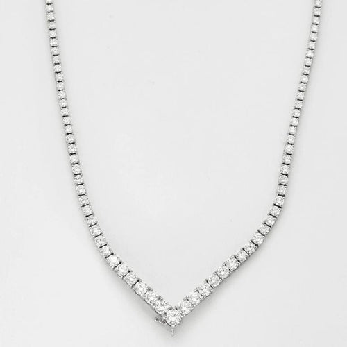 Collier Collier tennis rivière en chute en or blanc 18k et diamants 58 Facettes