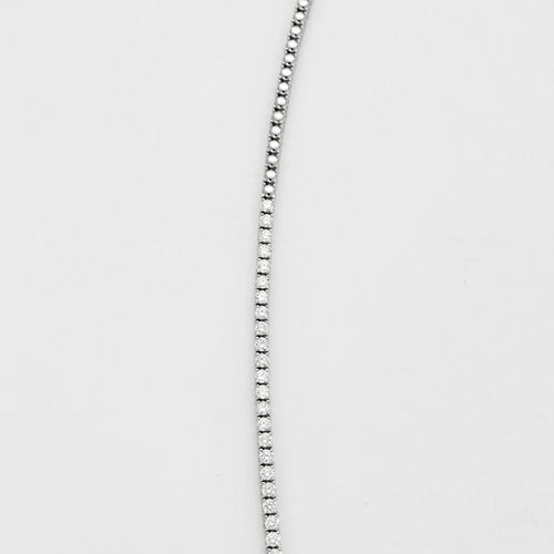 Collier Collier tennis rivière en chute en or blanc 18k et diamants 58 Facettes