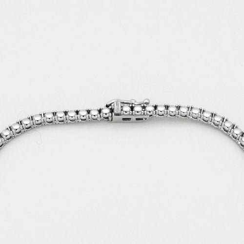 Collier Collier tennis rivière en chute en or blanc 18k et diamants 58 Facettes