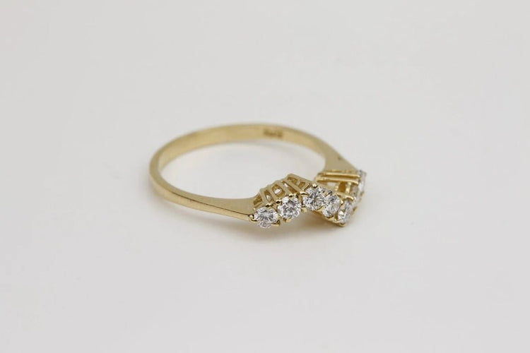 Bague 53 Bague vague en or jaune 18 carats et diamants 58 Facettes