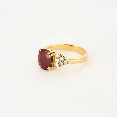 Bague 55 Bague en or jaune 18K sertie d’un rubis et diamants 58 Facettes