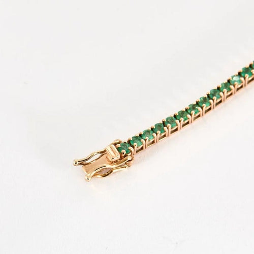 Bracelet Bracelet rivière en or rose 18K serti d’émeraudes 58 Facettes