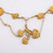 Collier Collier draperie aux œillets en or jaune 18 carats et perles 58 Facettes