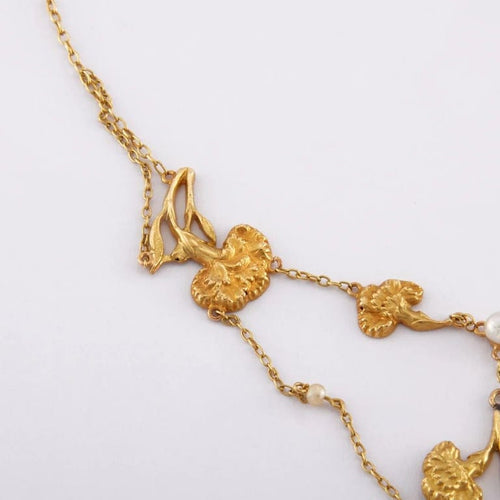 Collier Collier draperie aux œillets en or jaune 18 carats et perles 58 Facettes