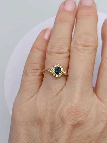Bague 57 Bague tourbillon en or 18k, saphir et diamants 58 Facettes