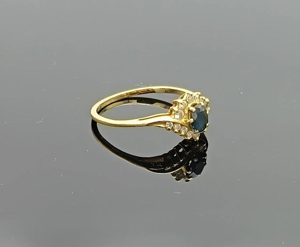 Bague 57 Bague tourbillon en or 18k, saphir et diamants 58 Facettes