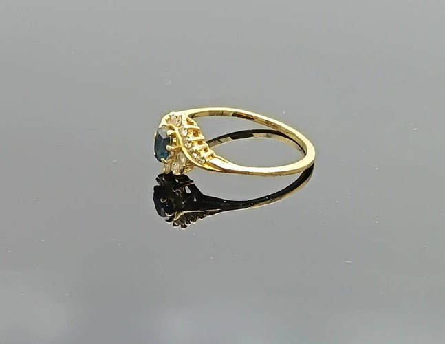 Bague 57 Bague tourbillon en or 18k, saphir et diamants 58 Facettes