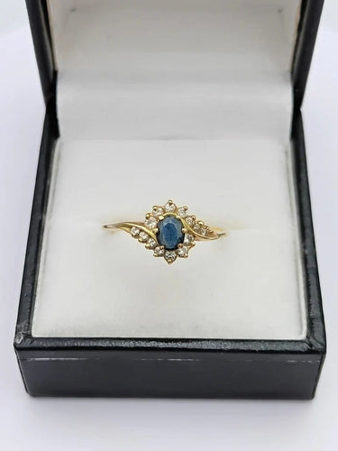 Bague 57 Bague tourbillon en or 18k, saphir et diamants 58 Facettes