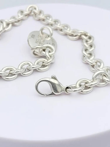 Collier Tiffany & Co - Collier ras-de-cou en argent 925 avec pendentif 58 Facettes