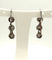 Boucles d'oreilles Dormeuses longues en or gris 18K serties de diamants 58 Facettes