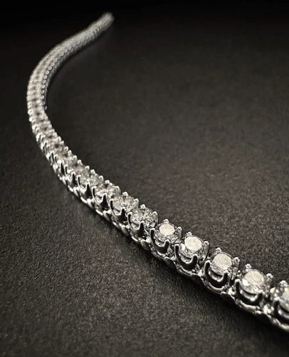 Bracelet Bracelet tennis en or blanc 18 carats et diamants 58 Facettes