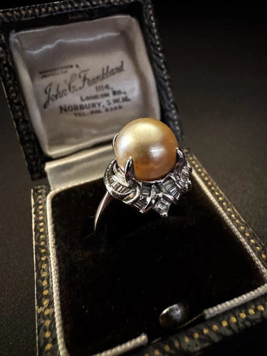 Bague 54 Bague en platine avec perle dorée et diamants 58 Facettes