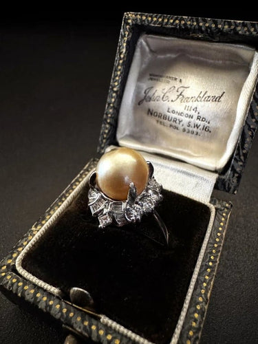 Bague 54 Bague en platine avec perle dorée et diamants 58 Facettes