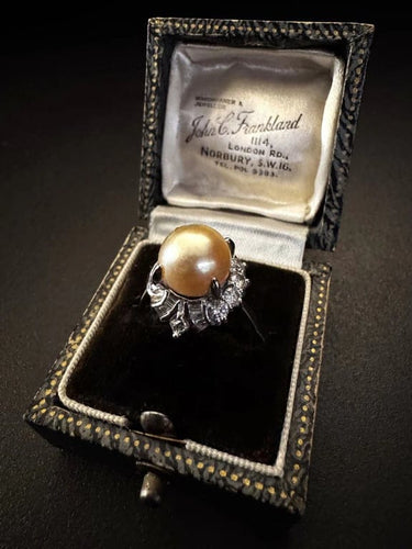 Bague 54 Bague en platine avec perle dorée et diamants 58 Facettes