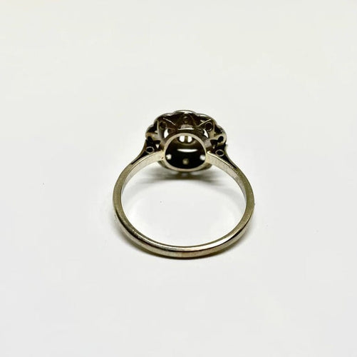 Bague 60 Bague marguerite en or gris 750 et diamants 58 Facettes