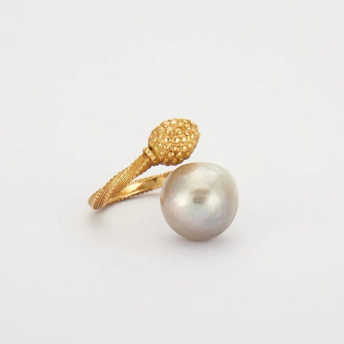 Bague 54 Bague en or jaune 18K avec perle South Sea 58 Facettes HS4288