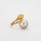 Bague 54 Bague en or jaune 18K avec perle South Sea 58 Facettes HS4288