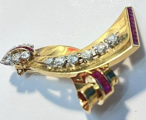 Broche Lackritz - Broche ruban en or jaune, rubis et diamants 58 Facettes 248596