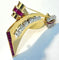 Broche Lackritz - Broche ruban en or jaune, rubis et diamants 58 Facettes 248596