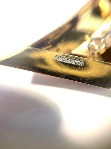Broche Lackritz - Broche ruban en or jaune, rubis et diamants 58 Facettes 248596
