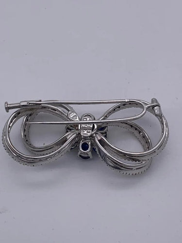 Broche Broche en or jaune 18 carats avec saphir et diamants 58 Facettes