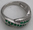 Bague 48 Bague en or blanc avec émeraudes et diamants 58 Facettes