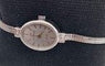 Montre Montre dame ovale en or gris et diamants 58 Facettes