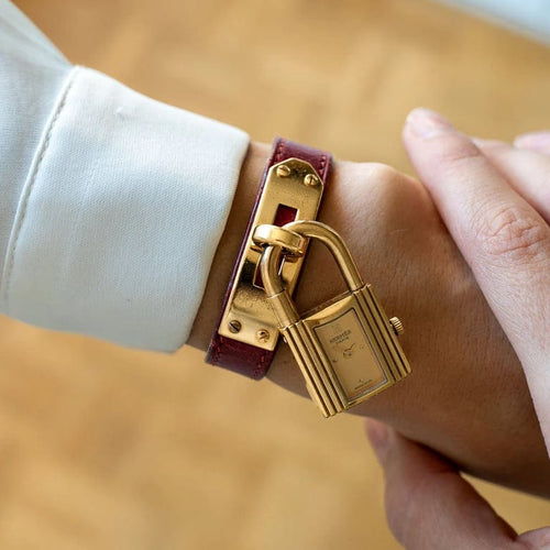 Montre Hermès Kelly - Montre à cadran champagne en acier plaqué or 58 Facettes