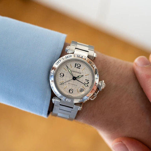 Montre Cartier Pasha GMT - Montre en acier cadran ivoire à chiffres arabes 58 Facettes