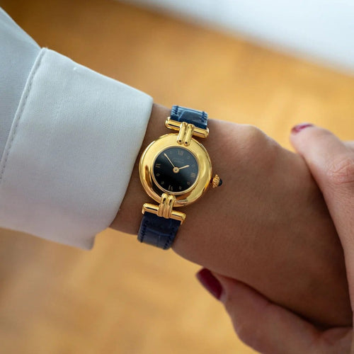 Montre Cartier Must Colisée - Montre femme 24 mm à cadran romain noir 58 Facettes