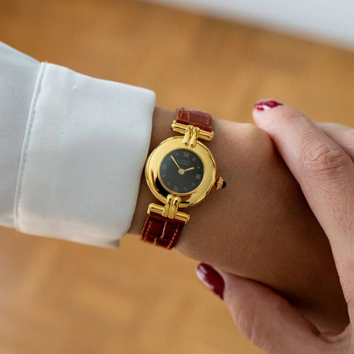 Montre Cartier Must Colisée - Montre femme à cadran romain noir 58 Facettes