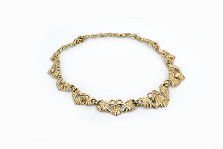 Collier Collier ancien années 40 en or jaune 18 carats 58 Facettes