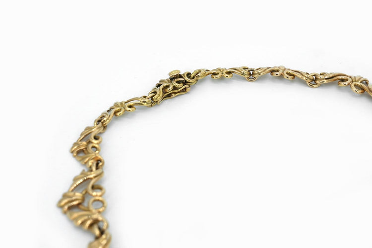 Collier Collier ancien années 40 en or jaune 18 carats 58 Facettes