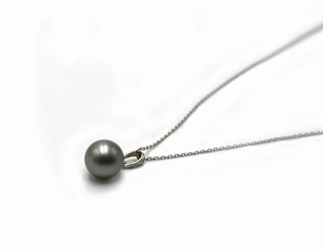 Collier Collier en or blanc 18 carats avec perle de Tahiti 58 Facettes