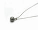 Collier Collier en or blanc 18 carats avec perle de Tahiti 58 Facettes