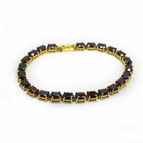 Bracelet Bracelet tennis en or jaune 18 carats et grenats 58 Facettes