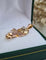 Pendentif Pendentif violon en or jaune 18 carats et spinelle synthétique 58 Facettes 385