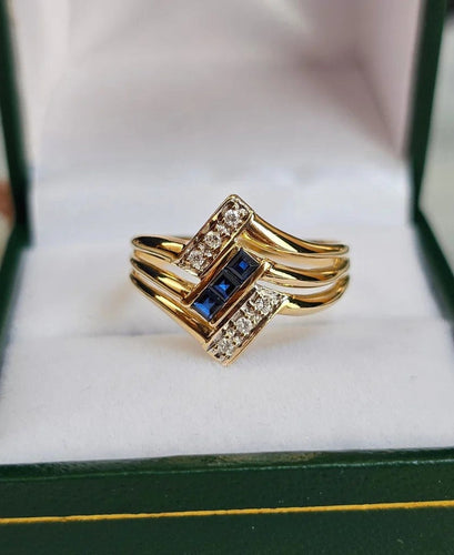Bague 58 Bague vintage en or jaune 18 carats avec saphirs et diamants 58 Facettes 592