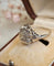 Bague 54 Bague vintage en or blanc 18 carats sertie d’un diamant jaune 58 Facettes 555