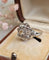 Bague 54 Bague vintage en or blanc 18 carats sertie d’un diamant jaune 58 Facettes 555