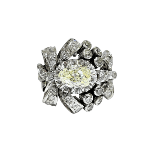 Bague 55 Bague années 50 à motif de nœuds en platine 850 et diamants 58 Facettes 1-775/2