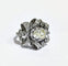 Bague 55 Bague années 50 à motif de nœuds en platine 850 et diamants 58 Facettes 1-775/2