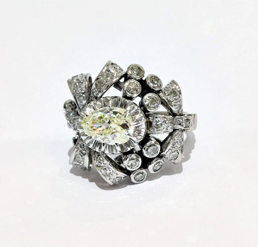 Bague 55 Bague années 50 à motif de nœuds en platine 850 et diamants 58 Facettes 1-775/2