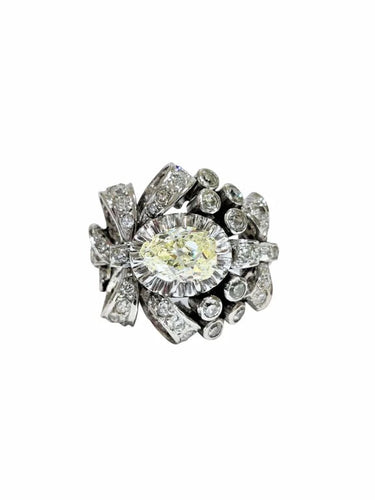 Bague 55 Bague années 50 à motif de nœuds en platine 850 et diamants 58 Facettes 1-775/2