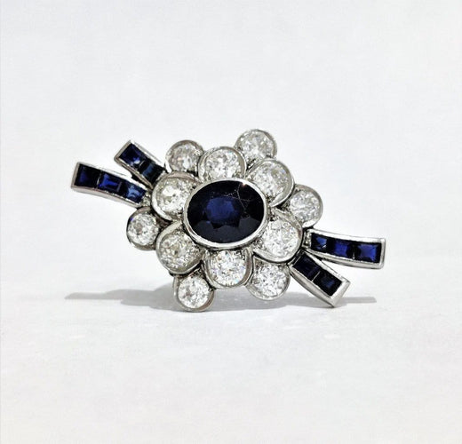 Boucles d'oreilles Broche clip de revers en platine 850 avec saphirs et diamants 58 Facettes 1-695/1